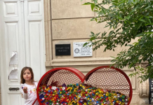 Un contenedor de tapitas en el Rotary Club de Mercedes
